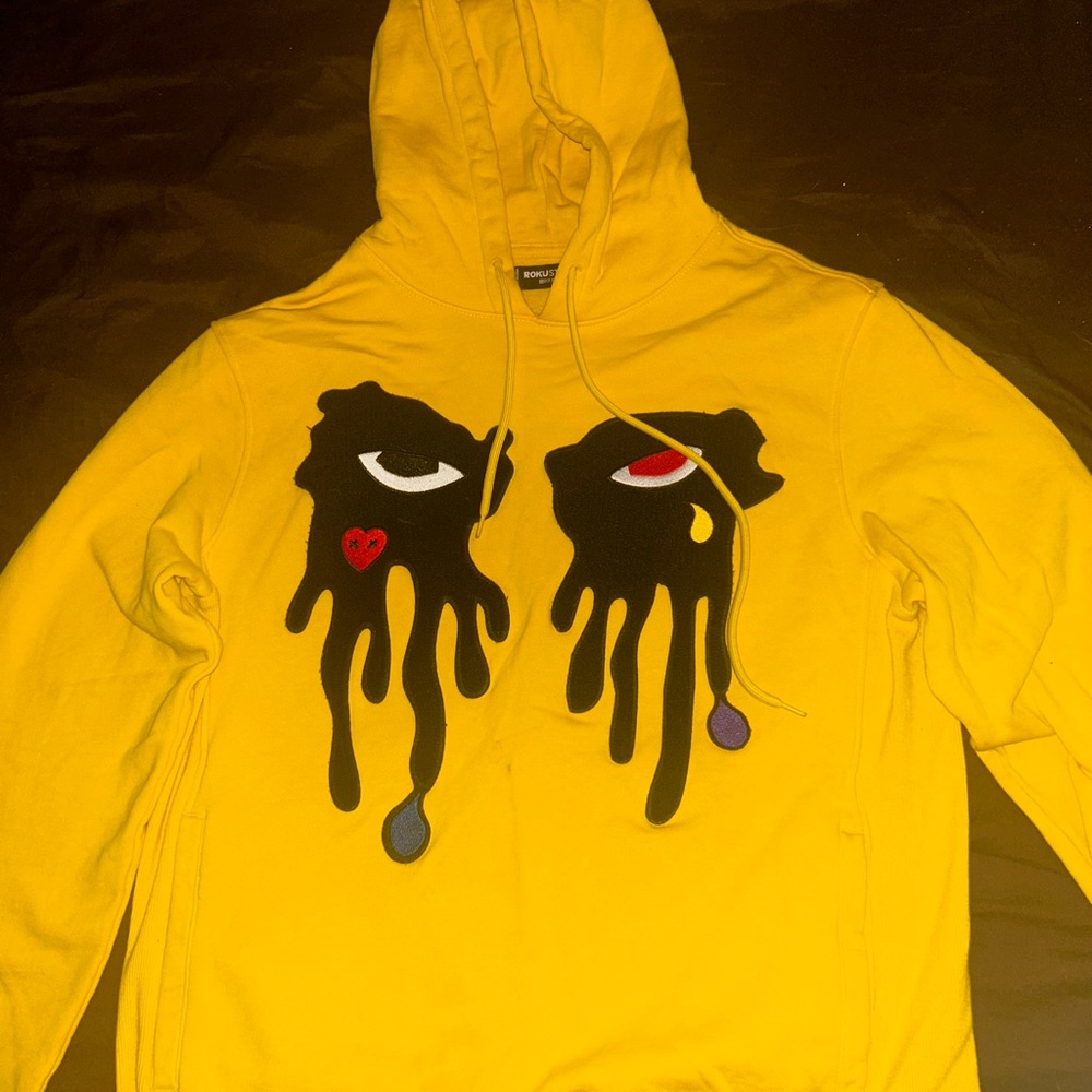 Yellow Hoodie with Dripping Face Design